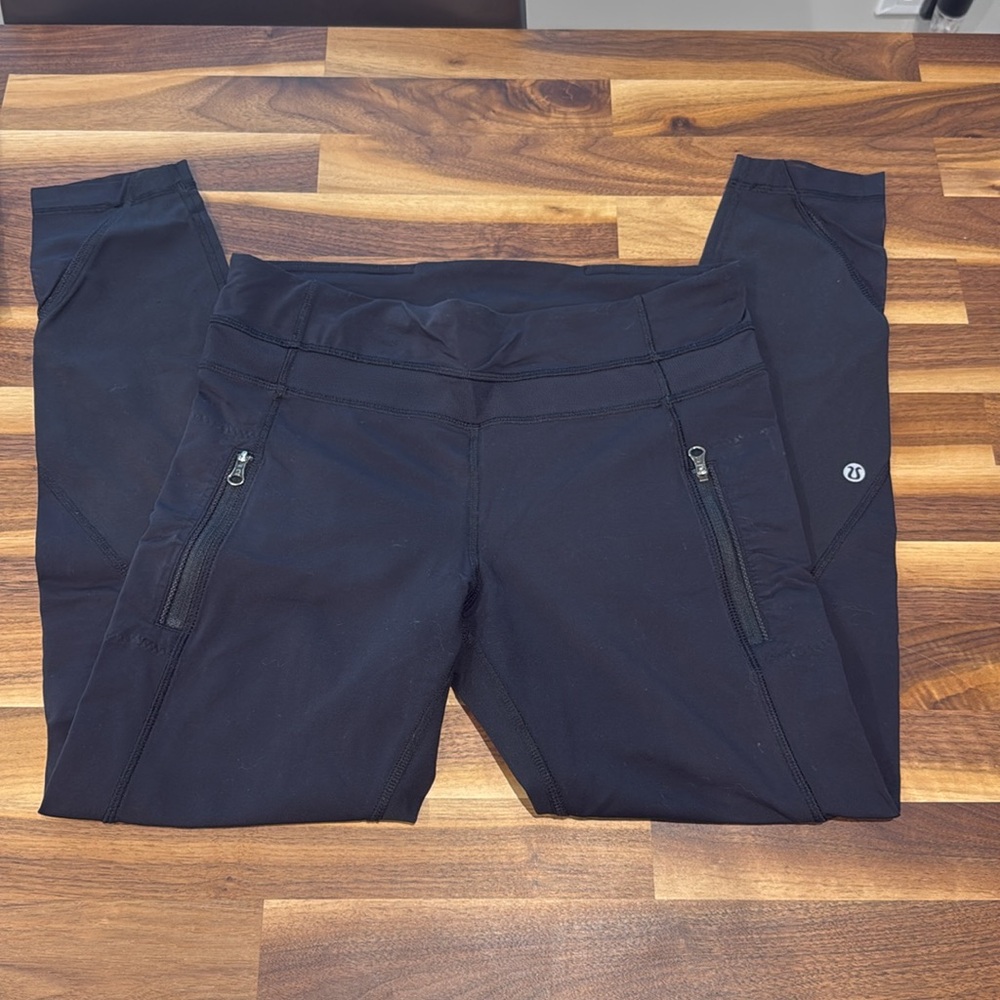 Black leggings with mesh inlay.